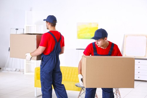 Moving van and packed boxes prepared for a Chelsea home move