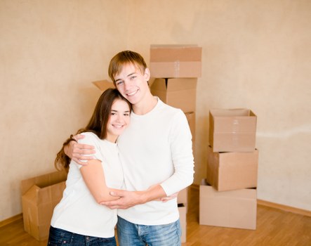 Unpacking boxes into a new home in Chelsea after a move