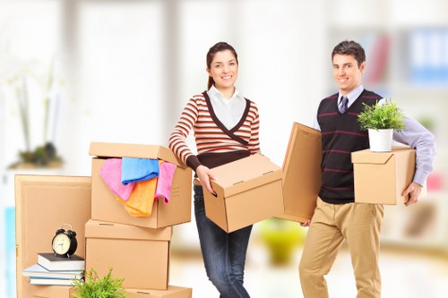 Careful handling of belongings by a Chelsea man and van team