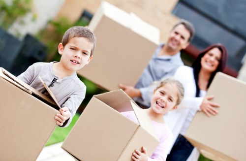 Chelsea move support with labelled boxes and room-by-room unpacking