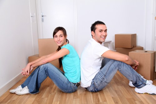 Local furniture removal service loading office furniture in Chelsea
