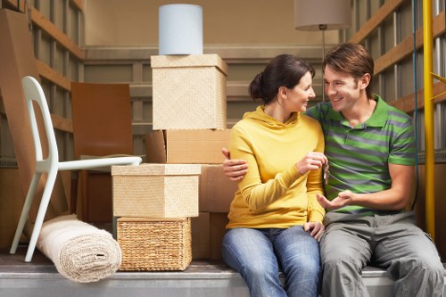 Packed apartment moving boxes ready for a Chelsea flat removal